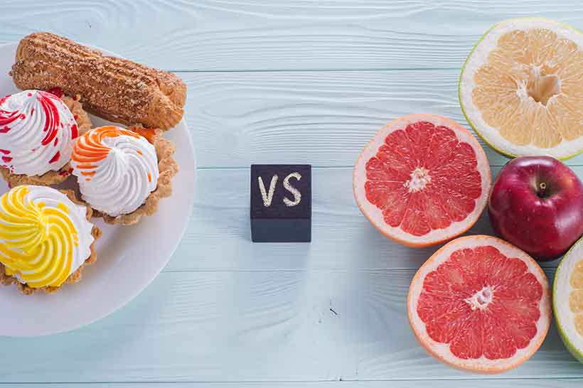 Not All Sources of Carbohydrate Are The Same. Processed Food Snacks vs. Whole Fruits On a Plate.