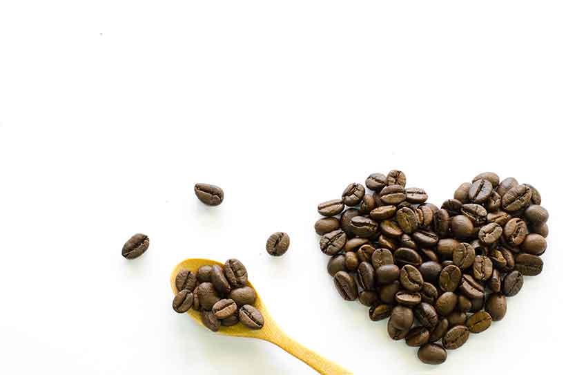 A Picture of a Heart Made From Coffee Beans.