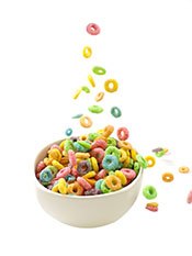 Fruit Loops Breakfast Cereal Pouring Into a Bowl.